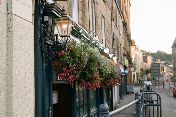 Street with flowers near pub